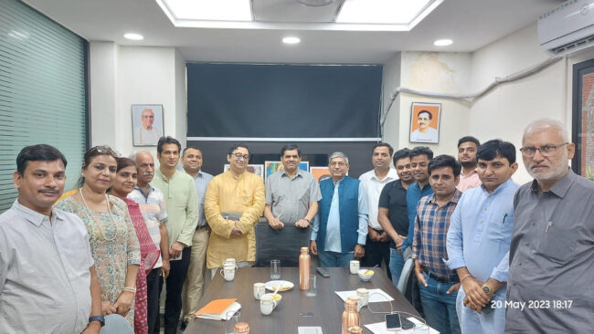 A meeting organised under the chairmanship of Prof. Ashwani Mahajan on "ONDC - A Game Changer"